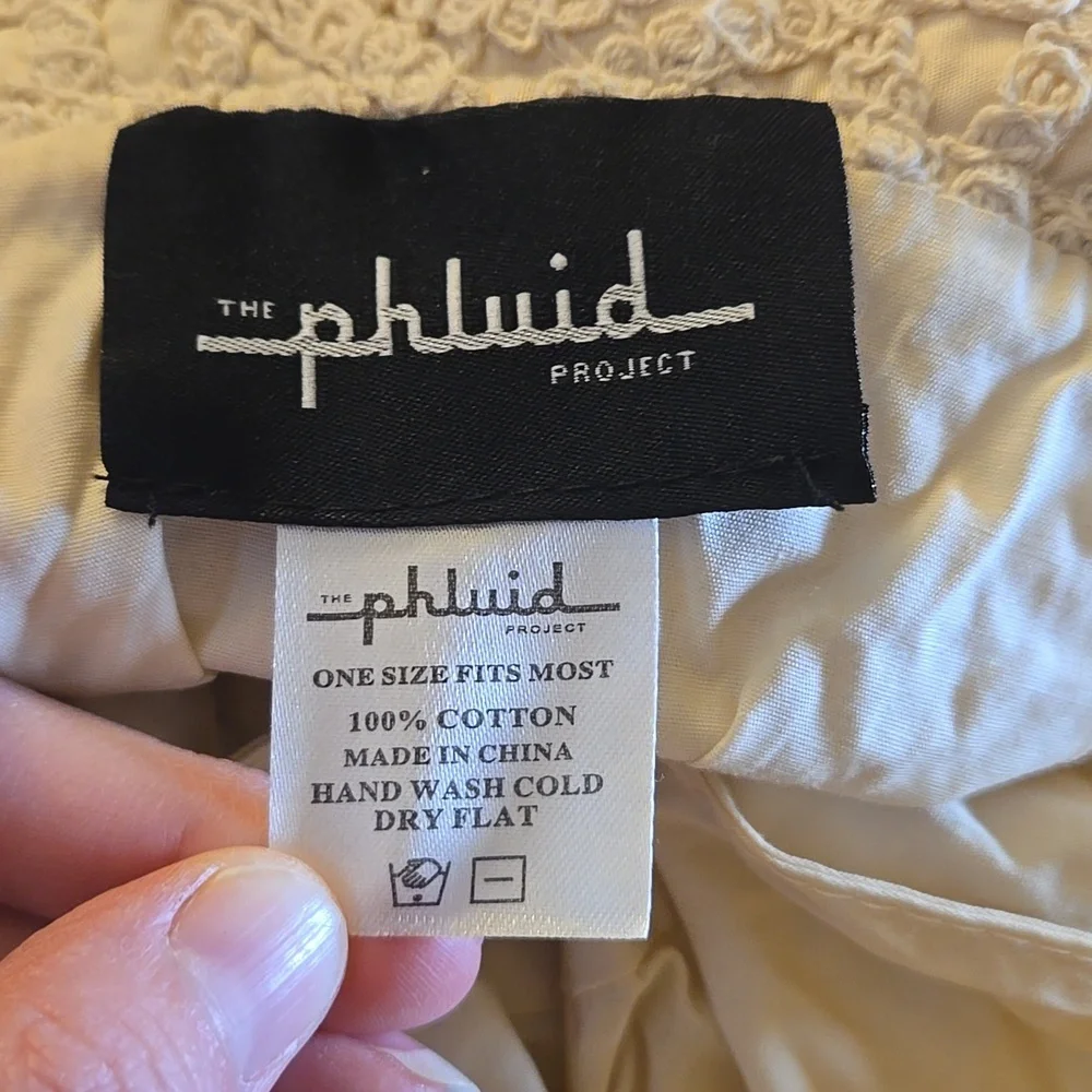 The Phluid Project cream boho crochet knit bucket hat